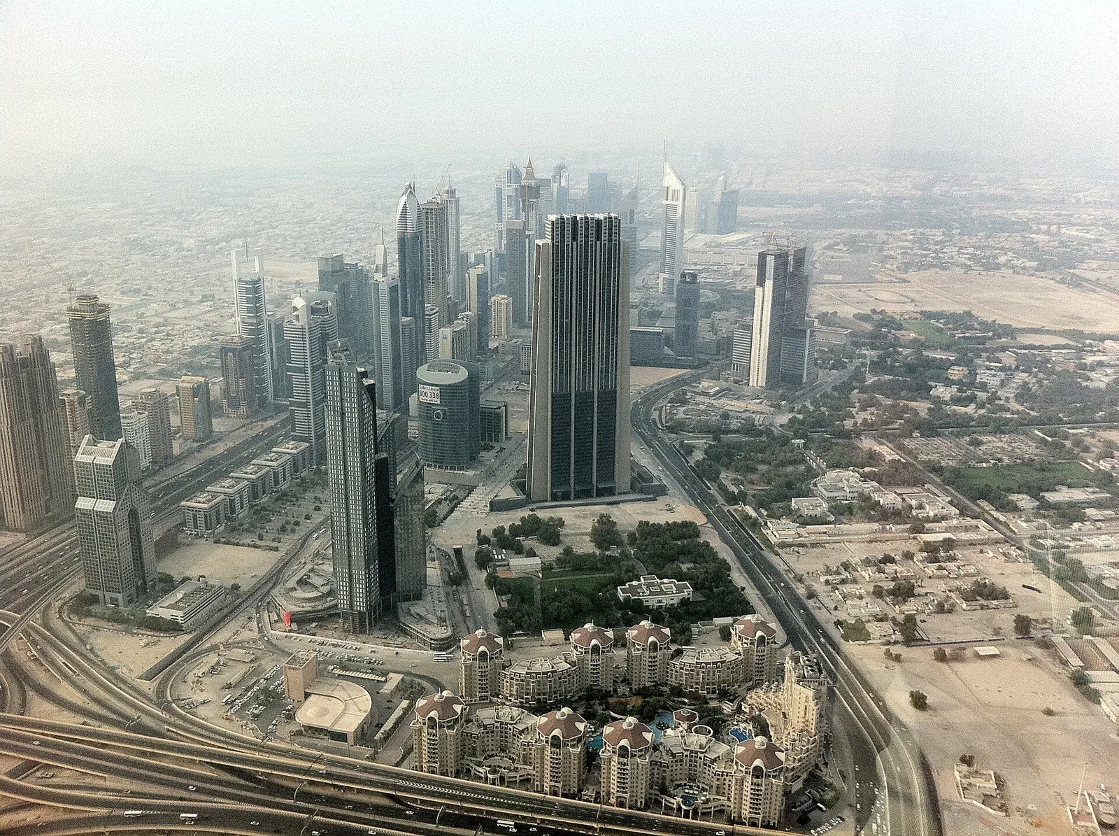 Aerial view of Downtown Dubai towers and Sheikh Zayed Road from the Burj Khalifa